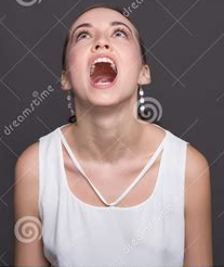 woman looking up fearfully